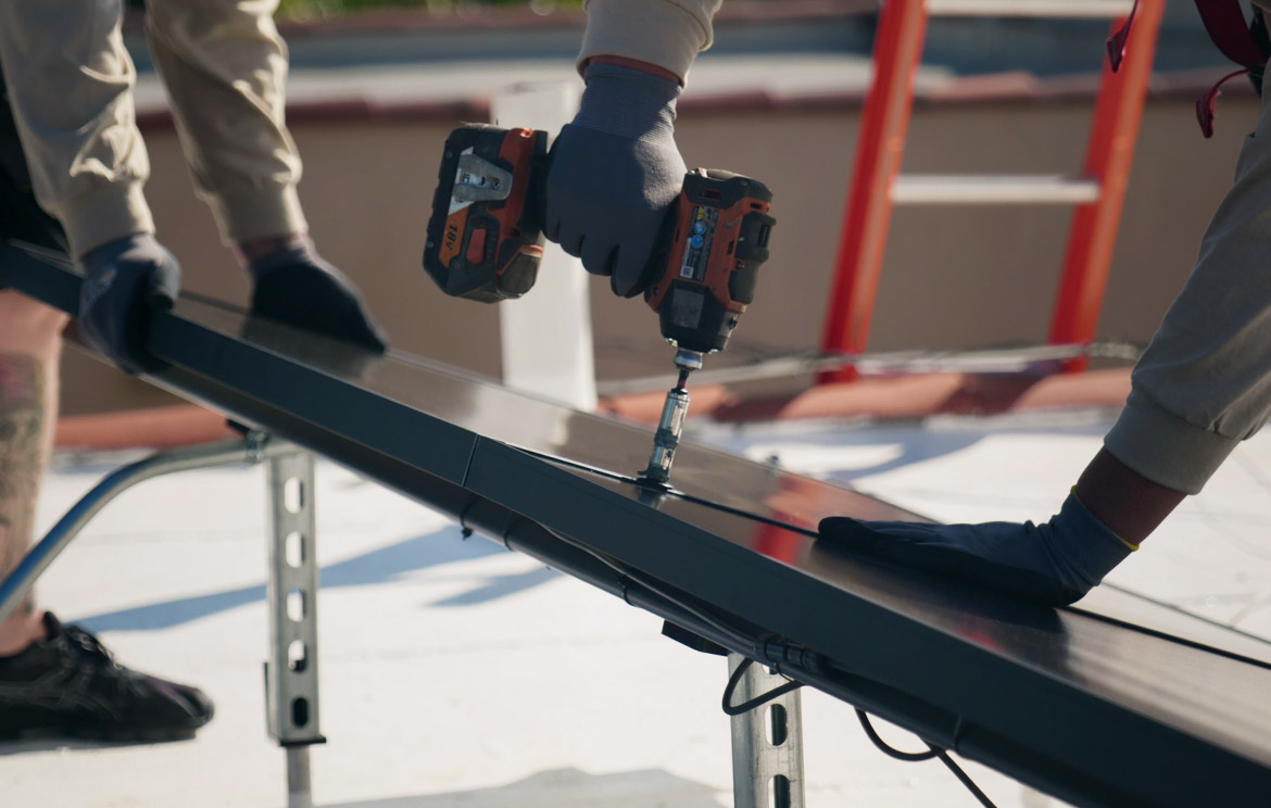 Solar Installers Drilling Solar Module