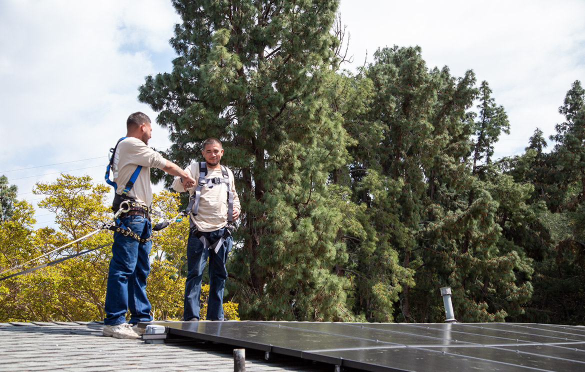 Team Members Happy About Solar Install