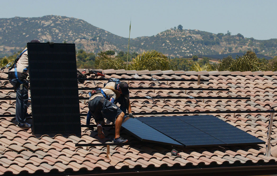 Solar Installers Securing Panels Los Angeles