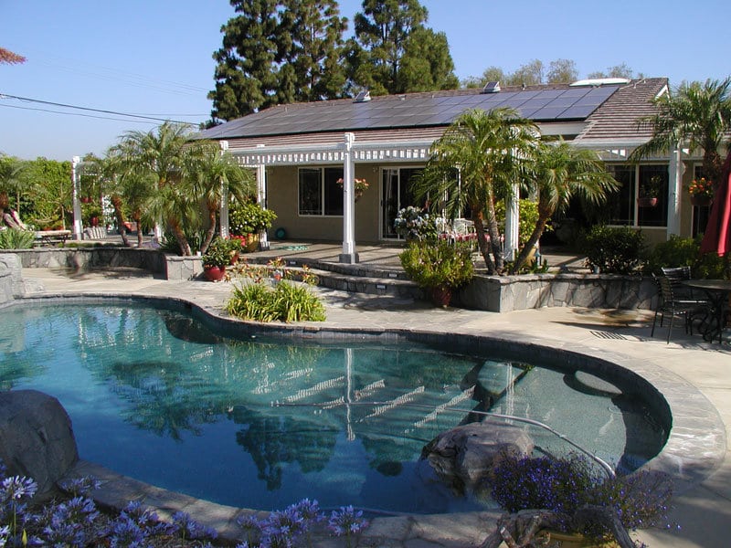 Solar Panels on rooftop at pool home